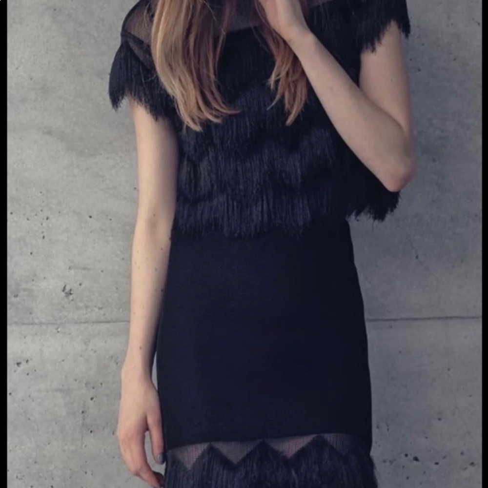 Alexis 2 piece black fringe top and pencil skirt. Never worn.